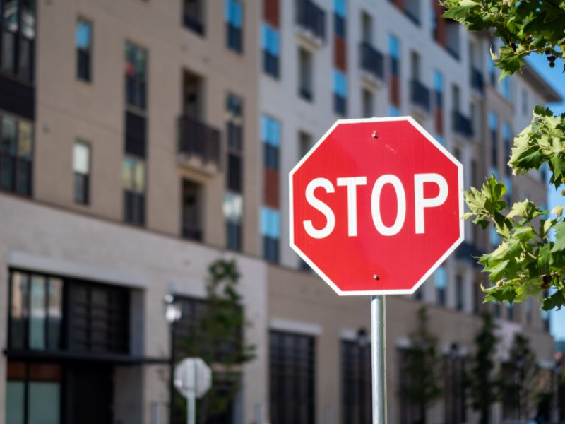 A red stop sign on a city street