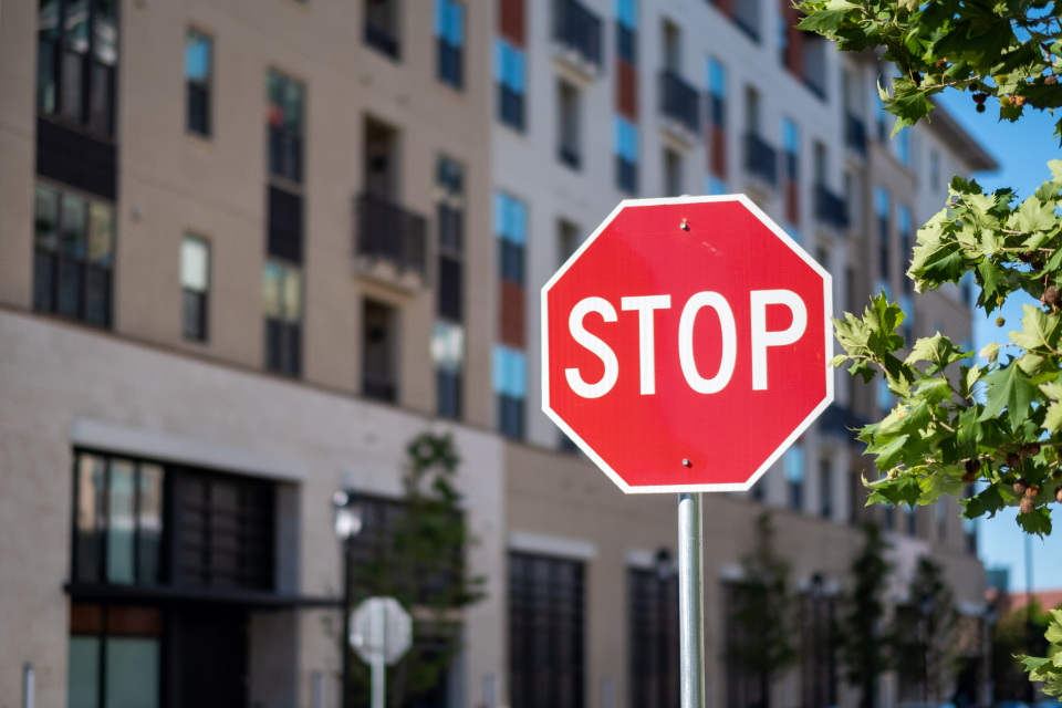 A red stop sign on a city street